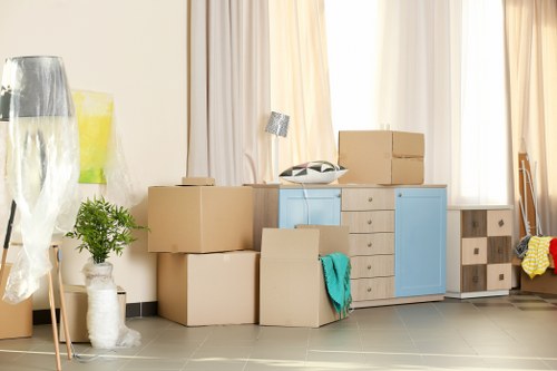 Office relocation planning in Uxbridge with moving boxes and furniture