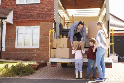 Packed boxes and furniture ready for a domestic move in Uxbridge