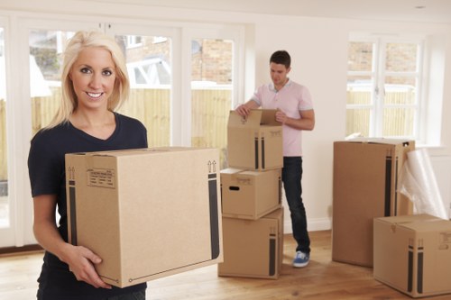 Boxes and home items prepared for transport by a local moving service