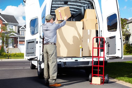 Organised moving team loading furniture for transport in Uxbridge