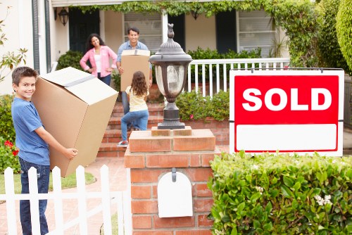 Professional removal team planning a move in a Uxbridge street