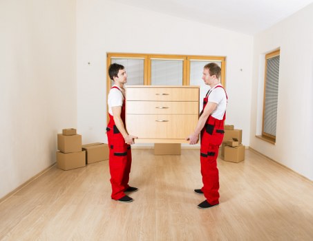 Local team collecting old furniture from a Uxbridge property